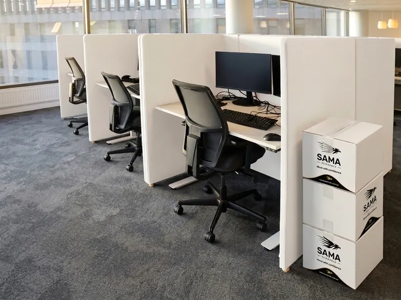 SAMA Removals boxes stacked in a city office fit-out