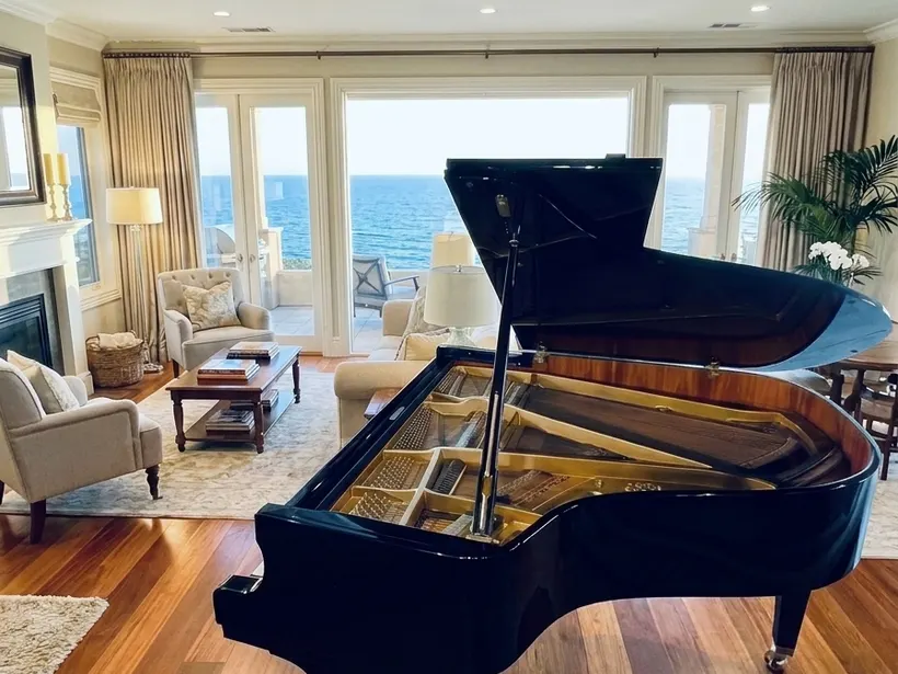 Grand piano placed in a coastal living room